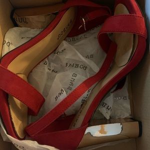 Red and gold Heels